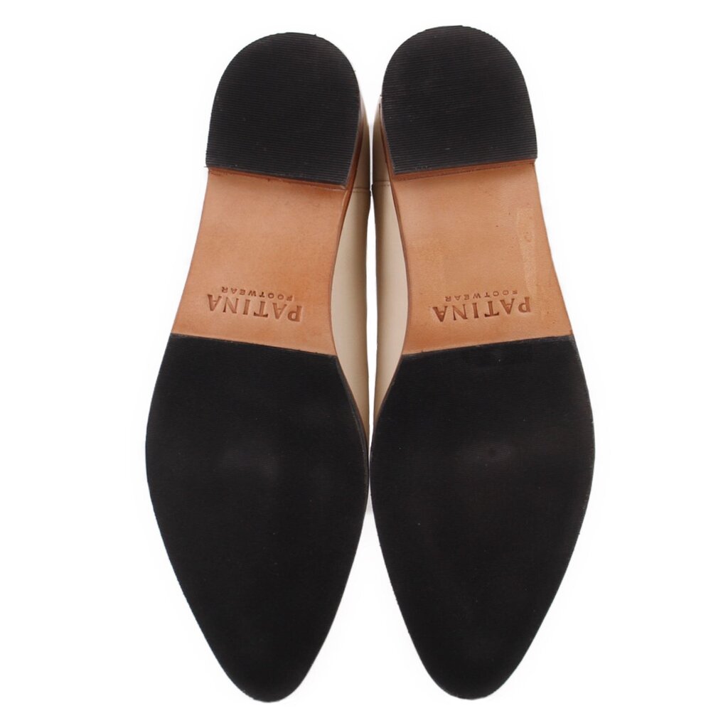 Pointed flats underside with black insole panels and brown edge