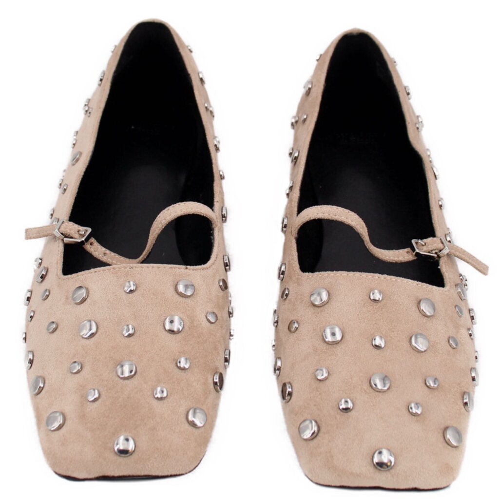 Pair of tan stud flats showing black lining and bow-tie strap