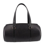 Black mini tote-style handle bag with textured leather-look finish and gold-tone accents