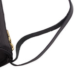 Black adjustable shoulder strap with stitched leather attachment