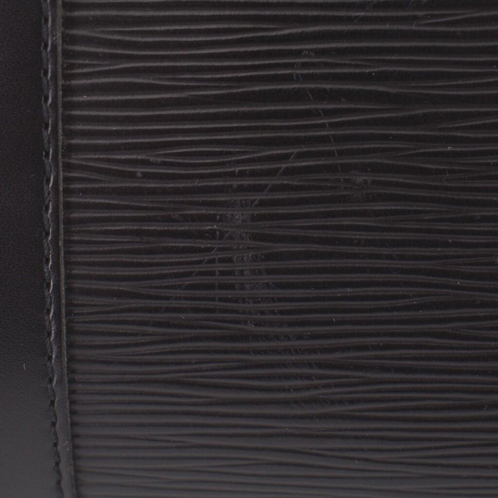 Black textured leather-look panel with stitched edge