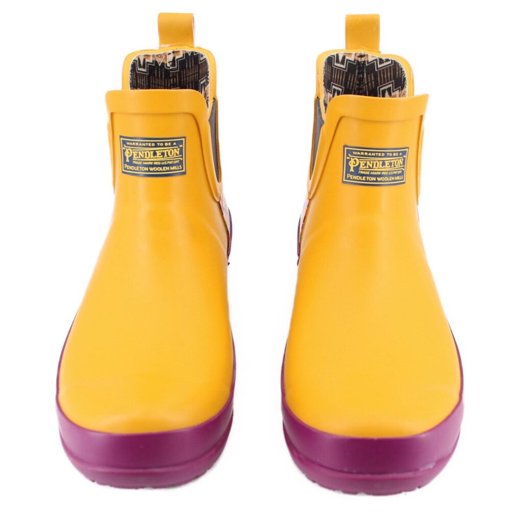 Pair of yellow chelsea rain booties with purple rubber toe caps and PENDLETON logos