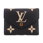 LOUIS VUITTON Victorine bifold wallet in black pebble leather with beige monogram flap