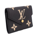 LOUIS VUITTON Victorine wallet with black pebbled leather and beige monogram flap detail