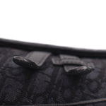 Close-up of black jacquard bag zipper track along top edge
