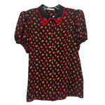 Black apple-print short-sleeve blouse with Peter Pan collar and red trim