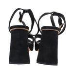 Black suede heeled sandals with ankle straps and block heels