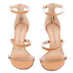 Pair of nude strappy high-heel sandals, shown from above