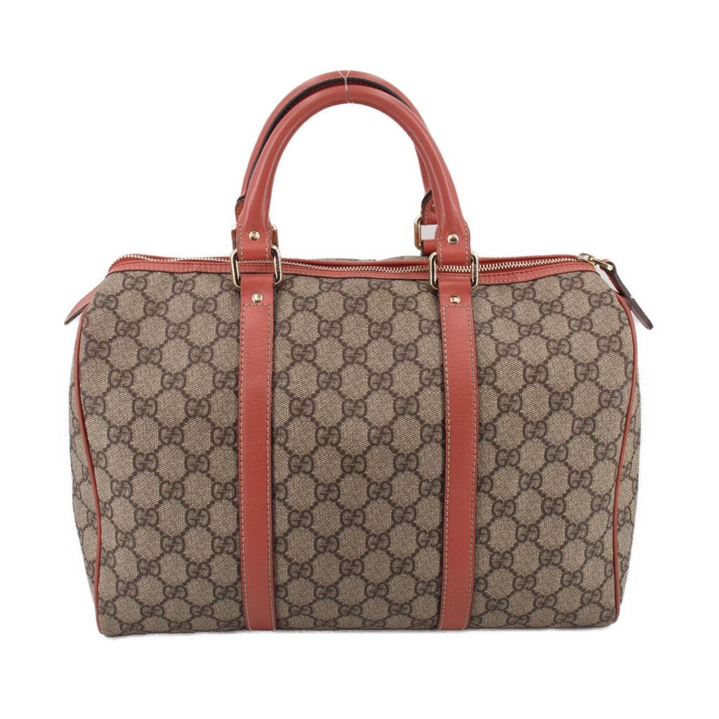 GUCCI Boston handle bag front view, tan GG canvas with rose center strap and top zip.