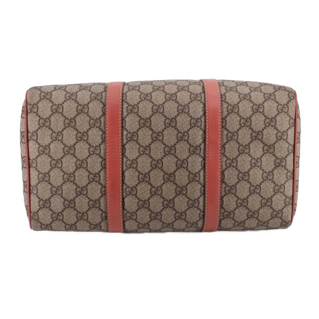GUCCI Boston handle bag back view, tan GG canvas with two rose vertical leather straps.