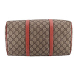 GUCCI Boston handle bag back view, tan GG canvas with two rose vertical leather straps.
