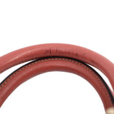 GUCCI Boston handle close-up, rose leather top handles with stitched trim edges.