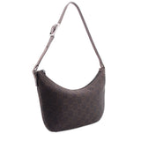 GUCCI brown GG monogram hobo shoulder bag angled view with top handle strap