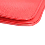 Red leather crossbody bag stitching and rounded flap edge detail