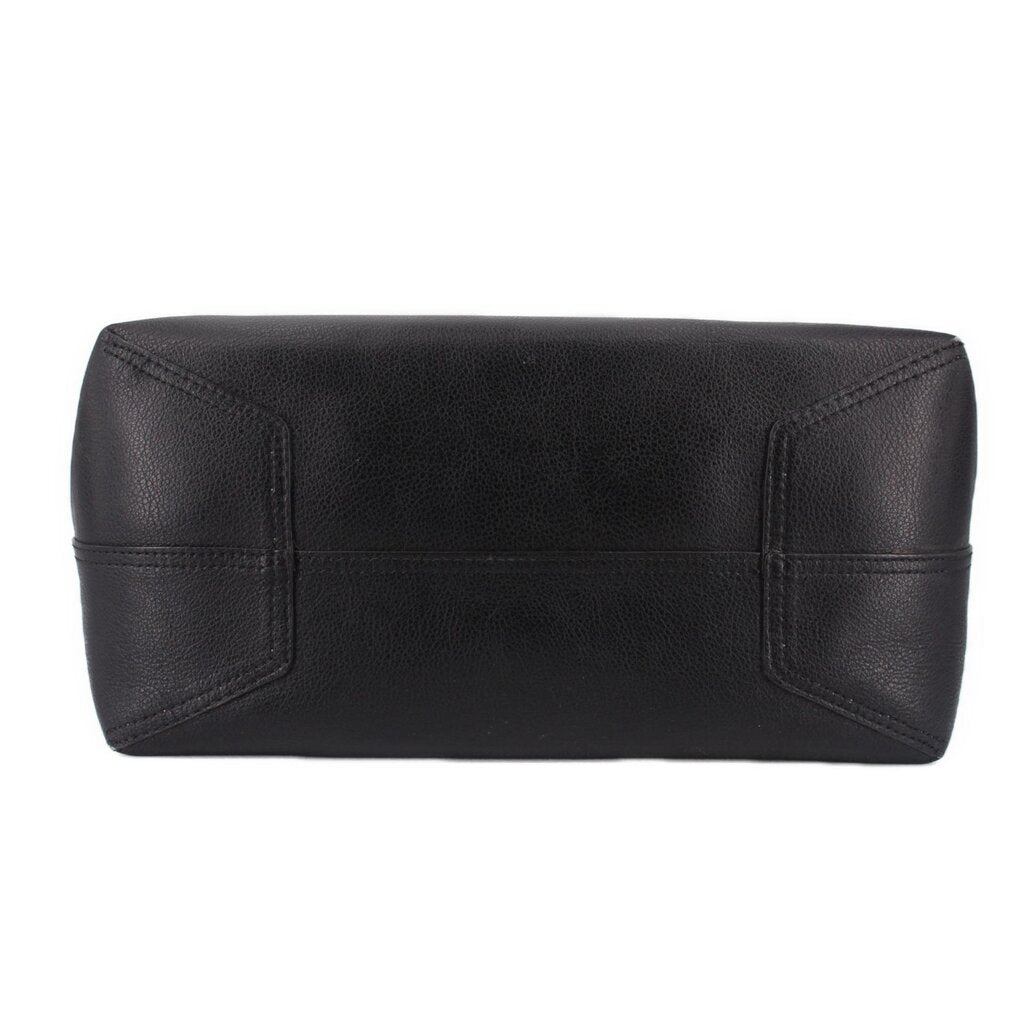 Black reversible tote bag close-up, top panel with stitched details.