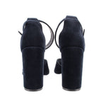 Back view of navy suede heeled sandals with ankle strap and block heel