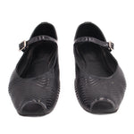 Black perforated flats with adjustable strap and open round toe