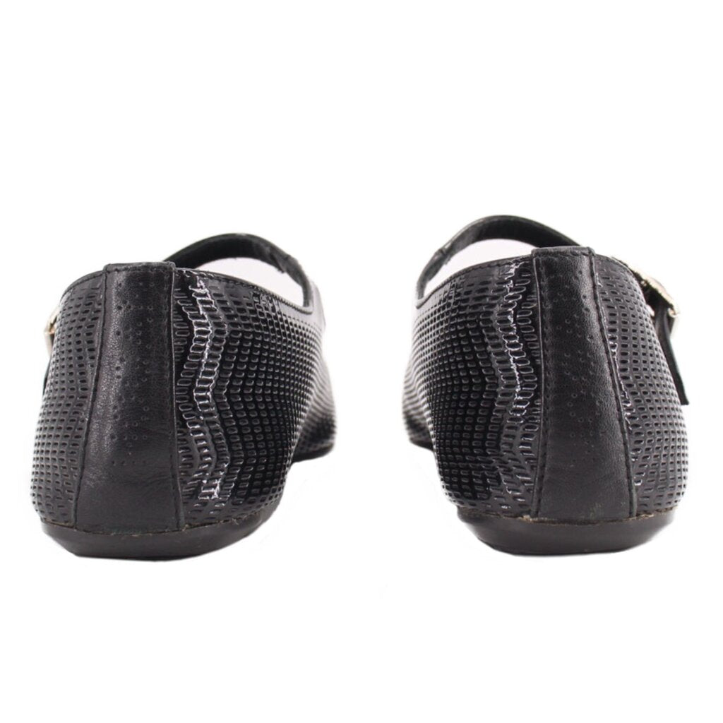 Black perforated flats with low heel and adjustable strap at back