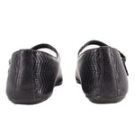 Black perforated flats with low heel and adjustable strap at back