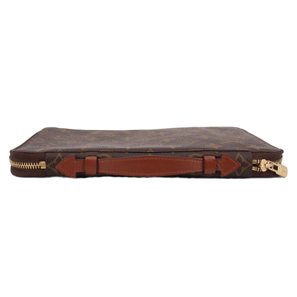 LOUIS VUITTON Voyage organizer wallet top view showing brown leather strap and zipper.
