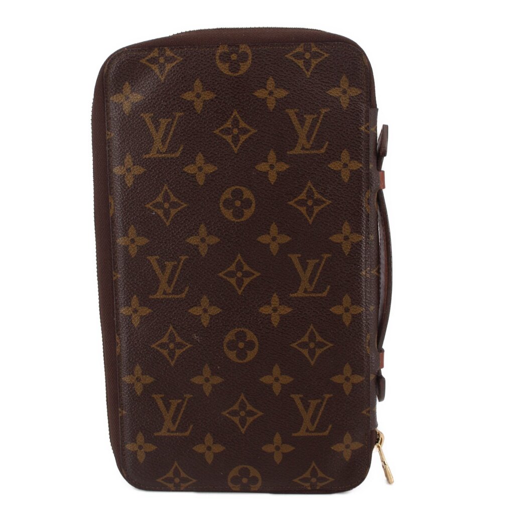 LOUIS VUITTON Voyage organizer wallet front view in brown monogram canvas with pull tab.