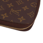 LOUIS VUITTON Voyage organizer wallet corner detail with gold-tone zipper trim.