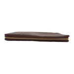 LOUIS VUITTON Voyage organizer wallet bottom view with gold-tone zipper edge.