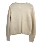 Cream knit jacket, ribbed hem and cuffs, back view with textured knit