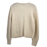 Cream knit jacket, ribbed hem and cuffs, back view with textured knit