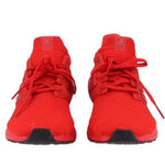 Red knit lace-up sneakers, front view with adidas logos and black outsole.