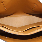 Tan leather tote interior view with stitched lining and open top