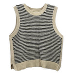Cream and black sleeveless knit top with ribbed crew neck and hem