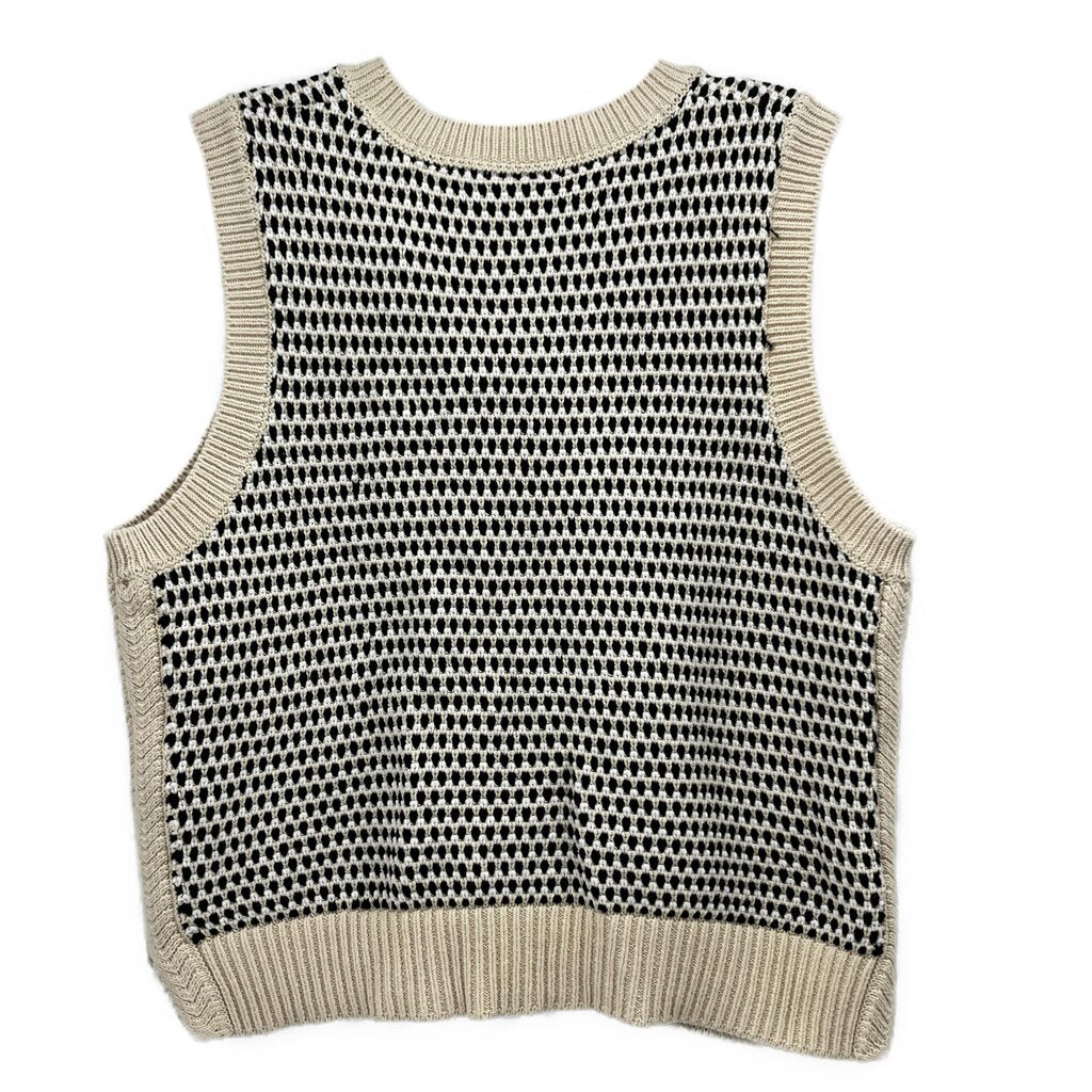 Cream and black sleeveless knit top with ribbed crew neck and allover pattern