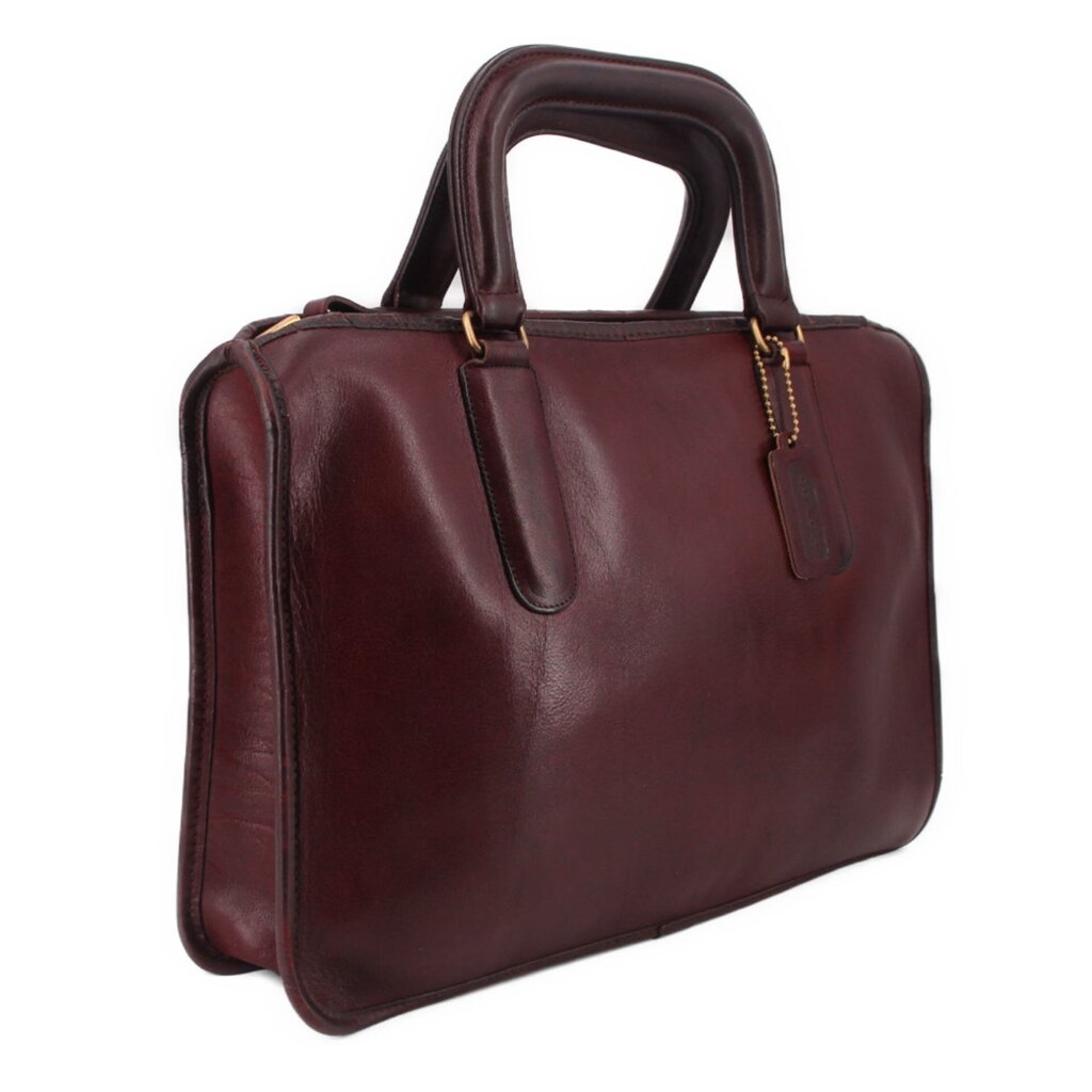 Oxblood slim leather satchel bag with top handles and side profile detailing