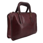 Oxblood slim leather satchel bag with top handles and side profile detailing