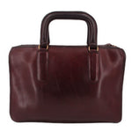 Oxblood slim leather satchel bag with two front handle straps and stitched trim