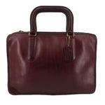 Oxblood slim leather satchel bag with top handles and front pocket strap