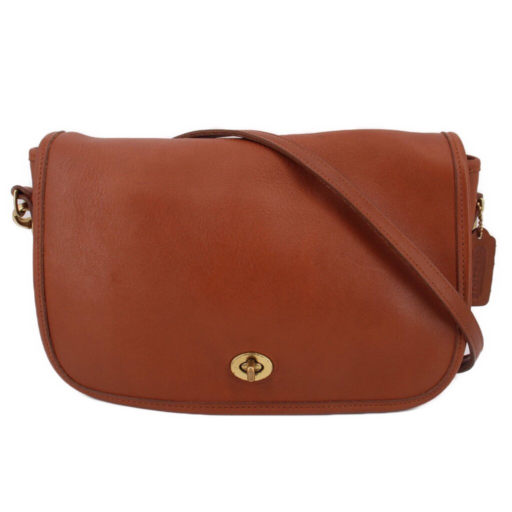 COACH vintage crossbody bag in British tan with flap and turn-lock closure