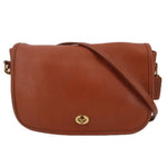 COACH vintage crossbody bag in British tan with flap and turn-lock closure
