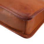 British tan leather tote bag corner with rounded seam detail and edge stitching