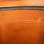 Coach vintage marketing tote interior with zipper and tan leather stitching