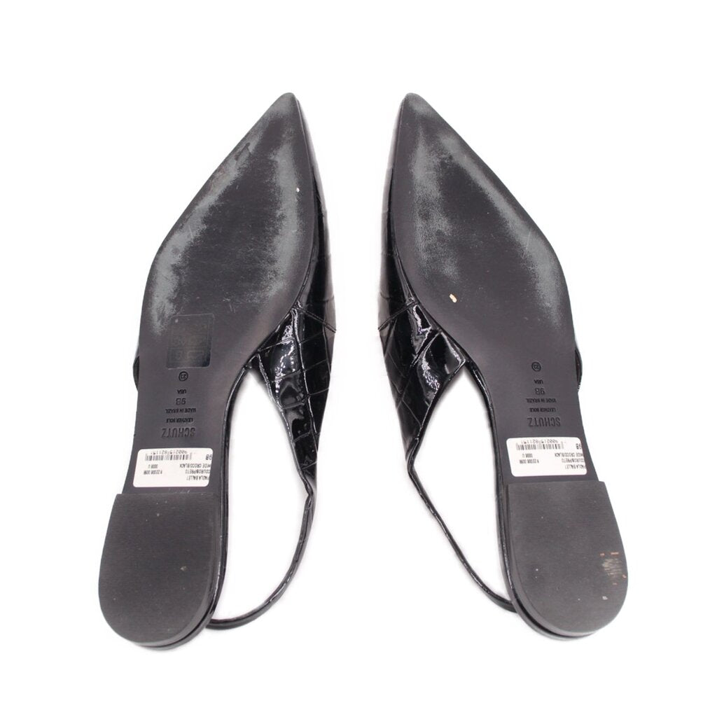 Black patent flats footbeds with printed size labels