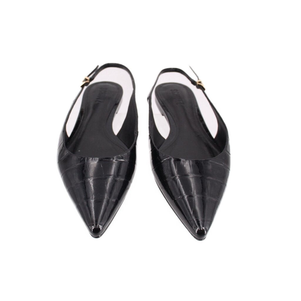 Black patent slingback flats shown from above, pointed toe and strap