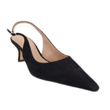 Black suede slingback heels, pointed toe, tan lining, slim heel with buckle strap.