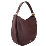 COACH NOMAD CROSSBODYS OXBLOOD