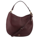 COACH NOMAD CROSSBODYS OXBLOOD