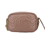 GUCCI mini Marmont taupe crossbody bag, front view with raised GG logo