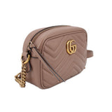 GUCCI mini Marmont taupe crossbody bag, side view with chain strap and zipper