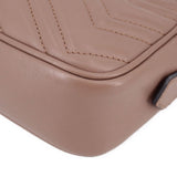 Taupe leather crossbody bag corner detail with stitched edging and zipper trim