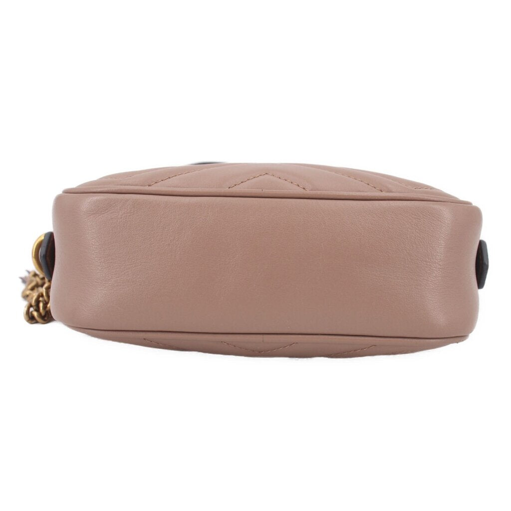 GUCCI mini Marmont taupe crossbody bag back view with smooth leather panel